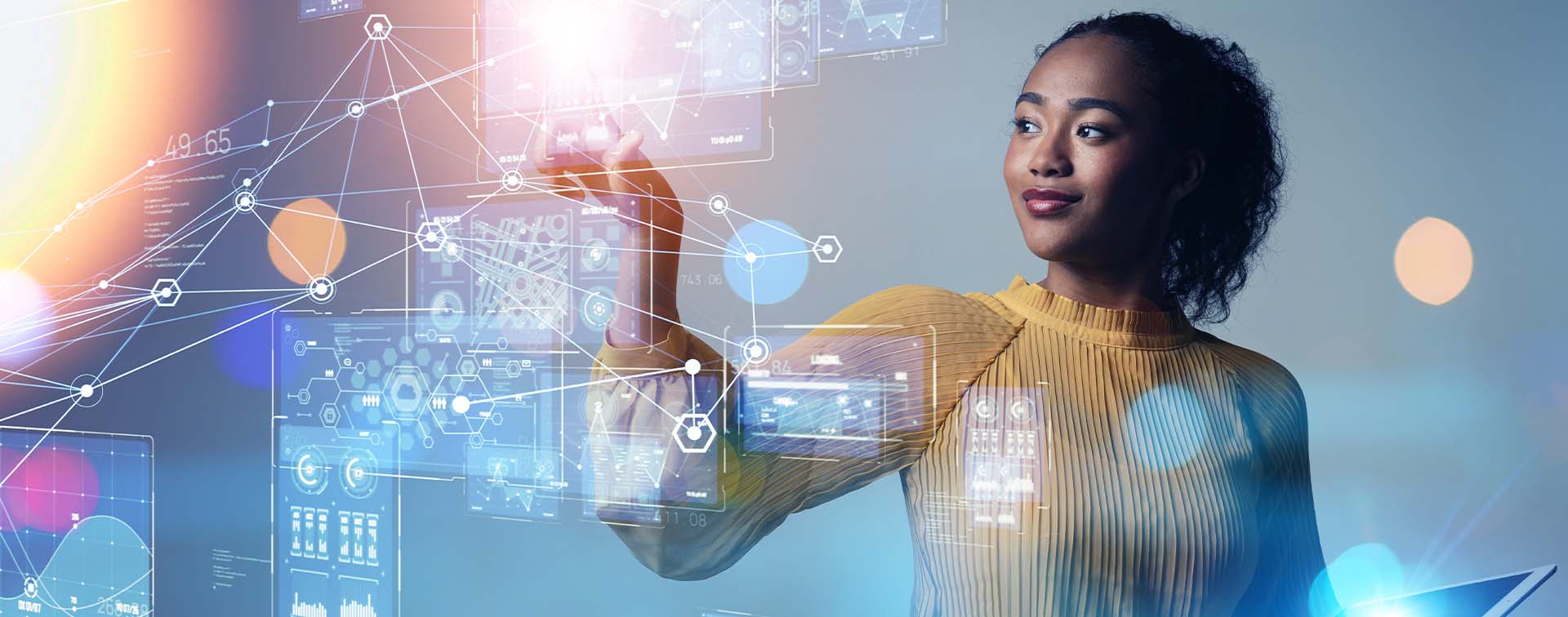 Digital composite of a woman reaching out to touch images of charts