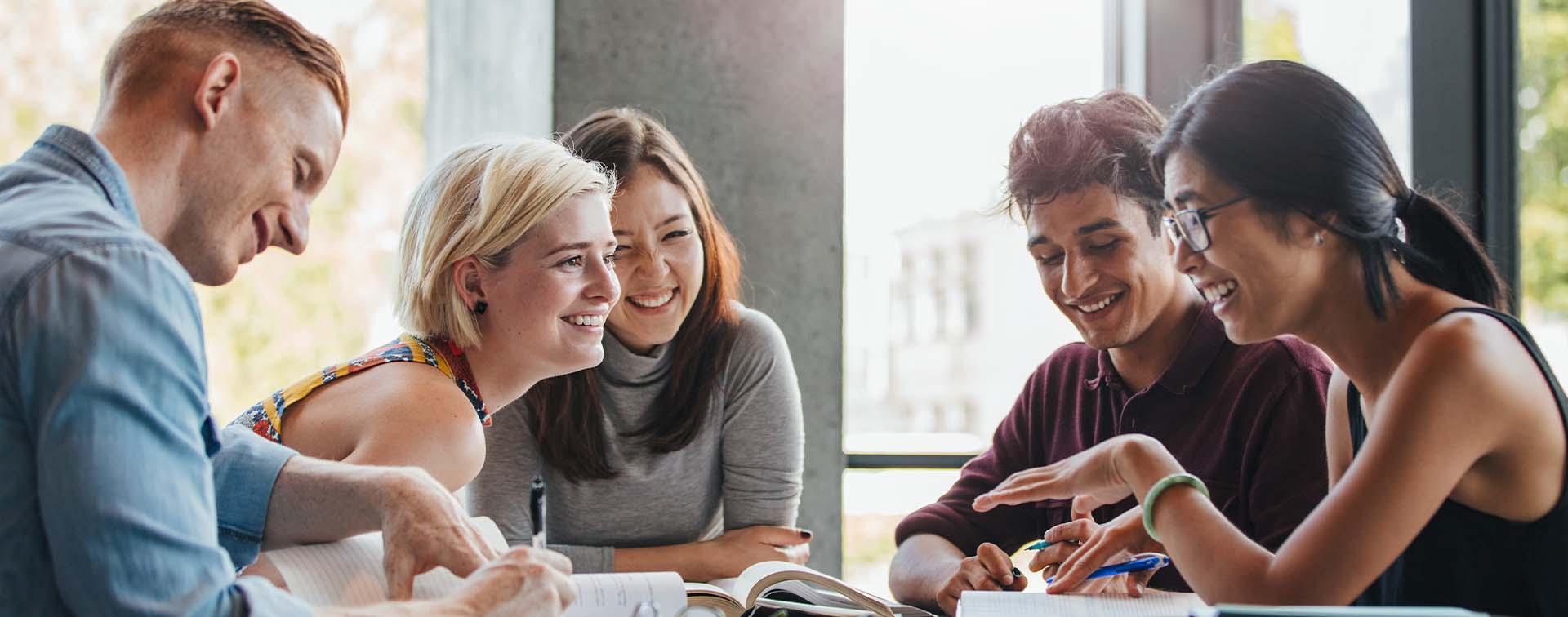 University students studying together around a table