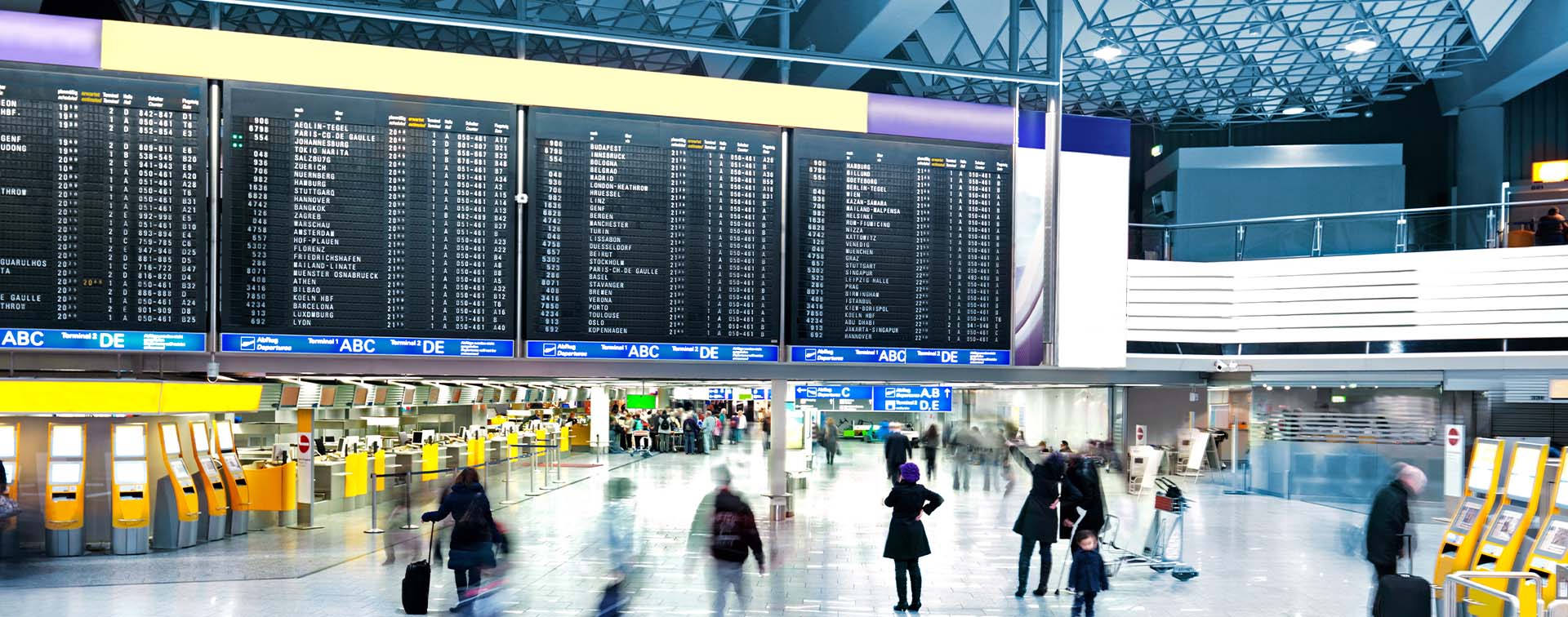 Modern Airport with people moving through it