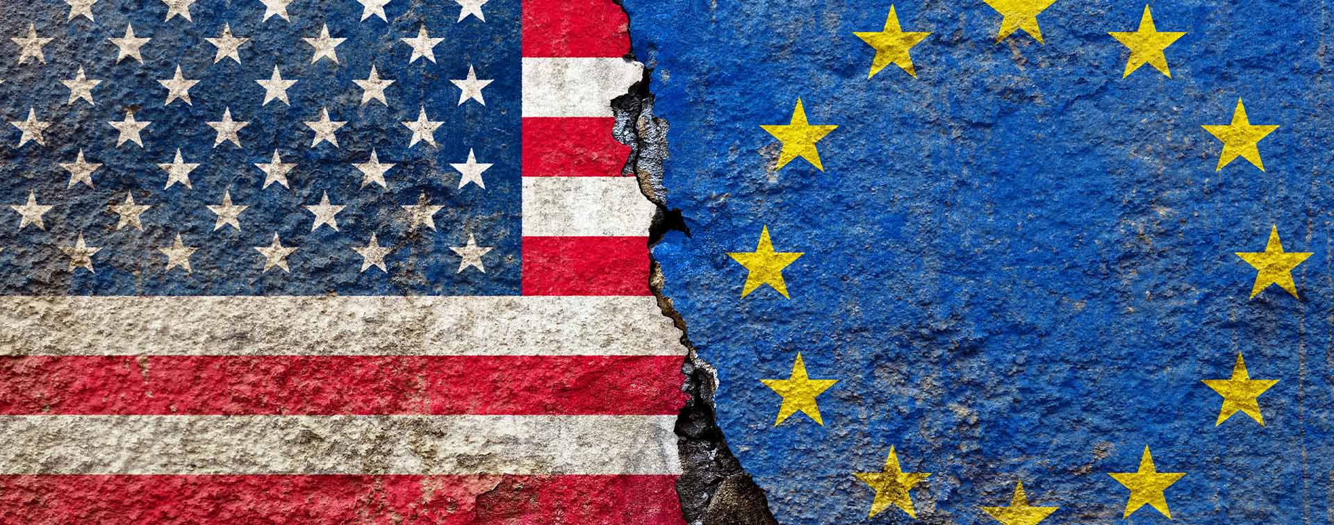 American and European Union Flag on Cracked Surface
