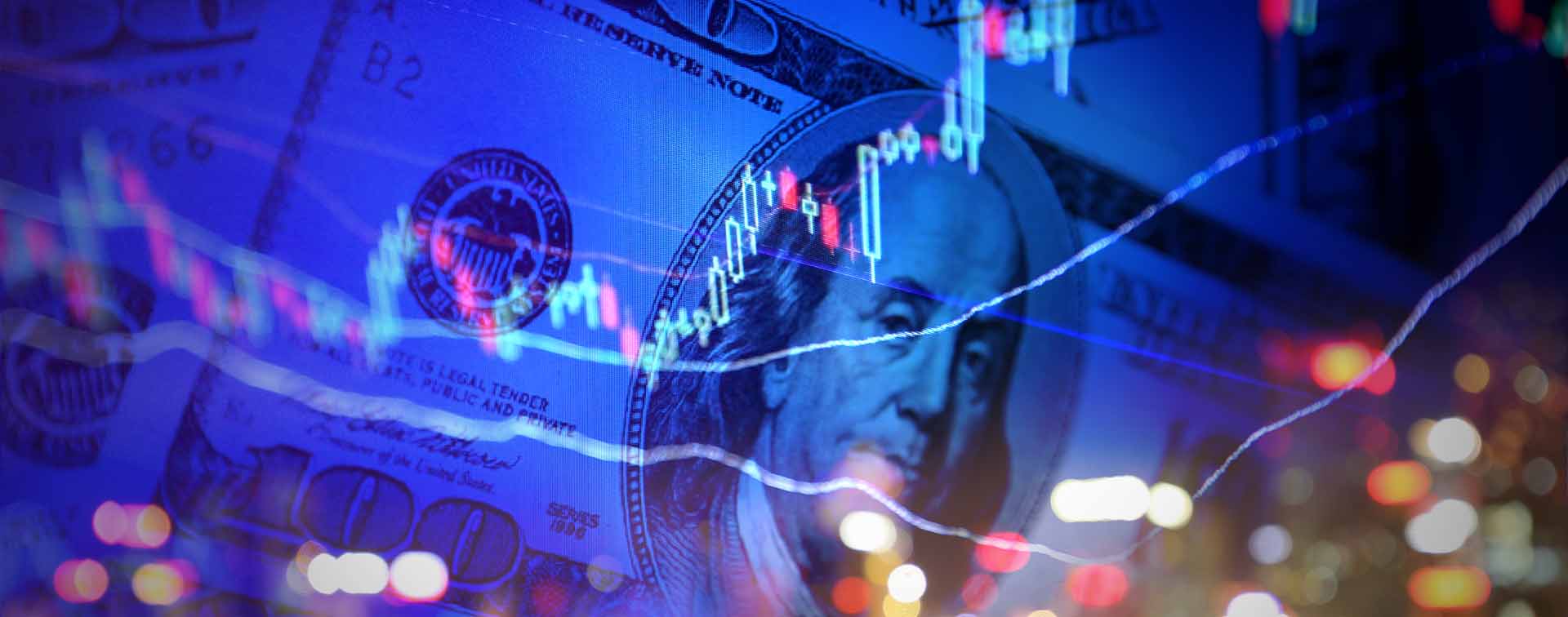 100 dollar note with stock market chart and city lights superimposed