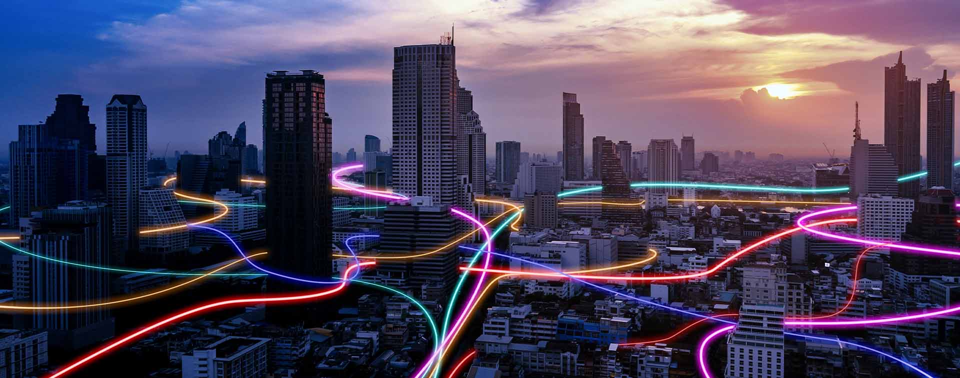 Smart city with glowing speed light trails surrounding the city