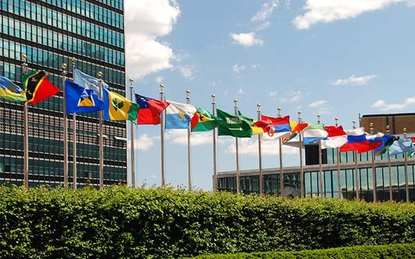 Line of world flags outside the United Nations headquarters