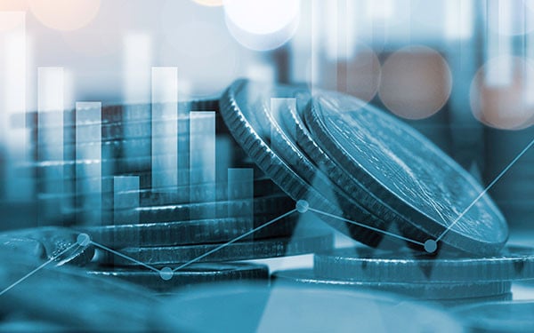 Abstract image of coins with a graph overlay