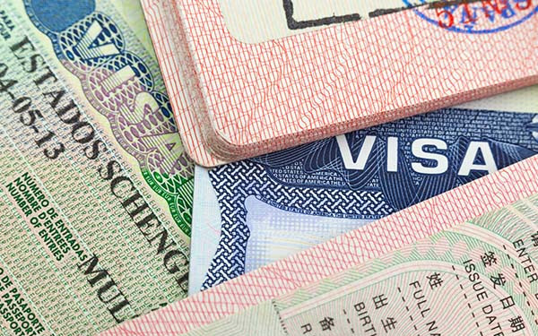 Chinese, USA and Shengen European visas in passports