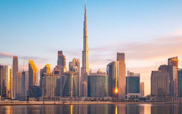Long exposure of The Business Bay Dubai city skyline at twilight, UAE