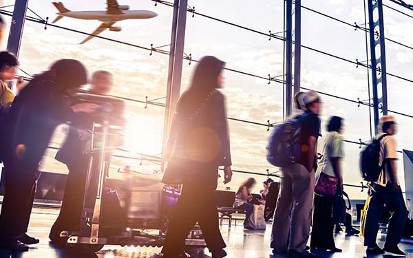 Blurred shot of people walking through Malaysia airport