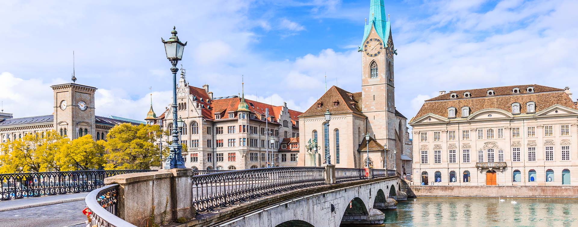 Zurich, Switzerland. View of the historic city center with famous Fraumunster Church, on the Limmat river