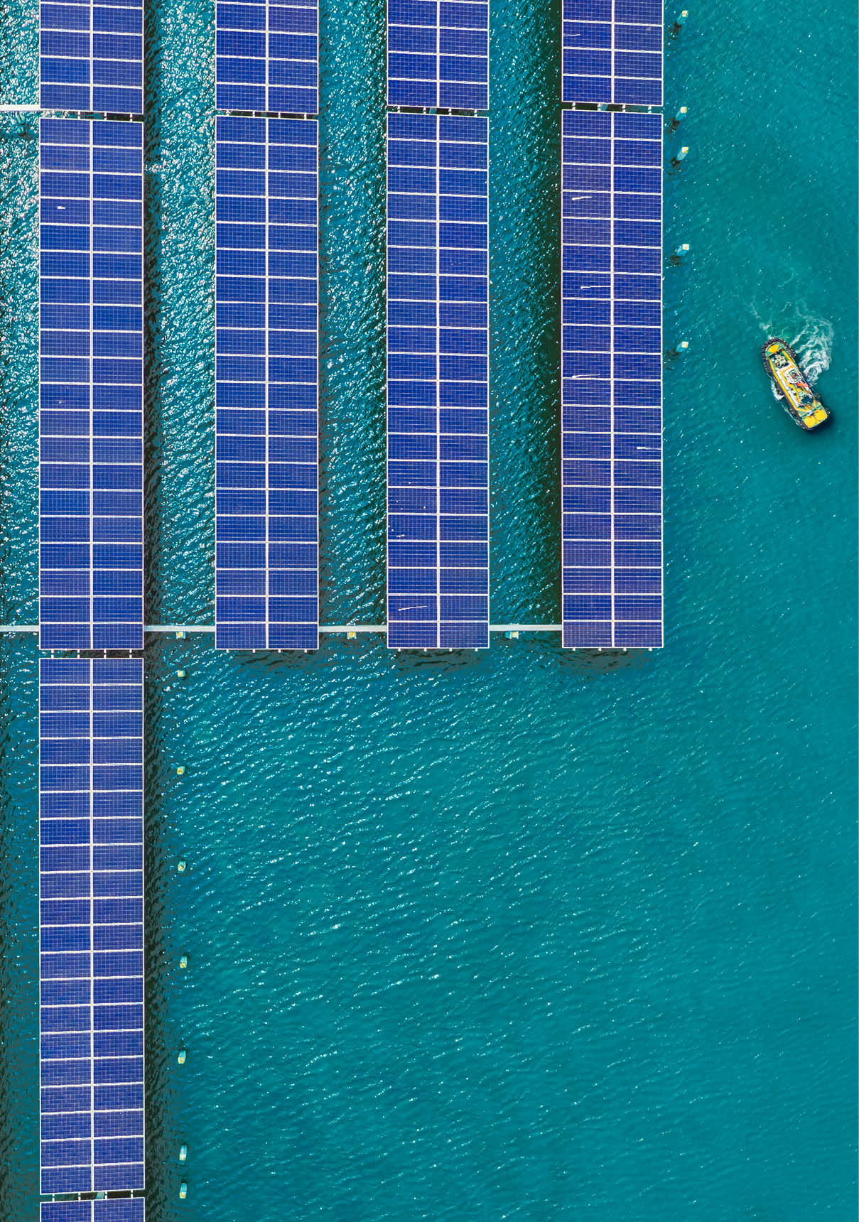 Aerial view Sun solar power installed on salt farm for generate clean power energy. Environmental conservation or Clean energy power concept.